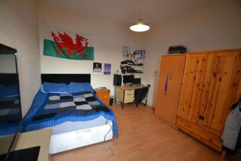 Bright, well-appointed bedroom with a double be...