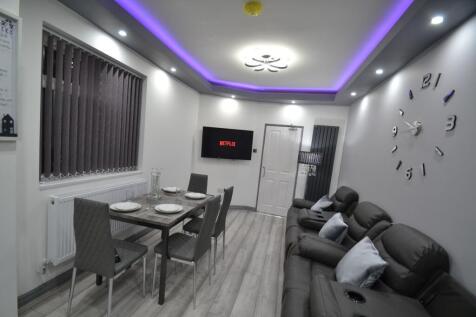 Modern and inviting living room featuring comfo...