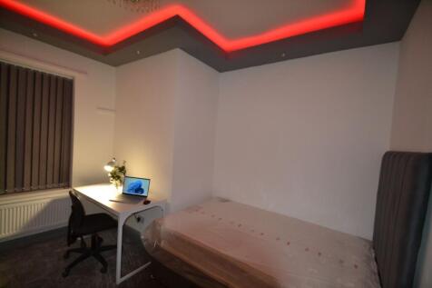 Modern and stylish living space featuring a coz...