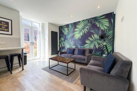 Bright contemporary living room with a bold tro...