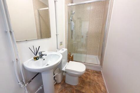 A clean and well-maintained bathroom featuring ...