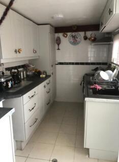 A functional kitchen with ample storage and a c...