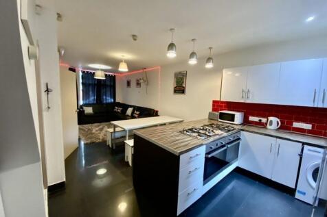 Bright, open-plan living space with a modern ki...