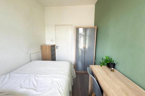 Bright, neatly presented bedroom with a double ...