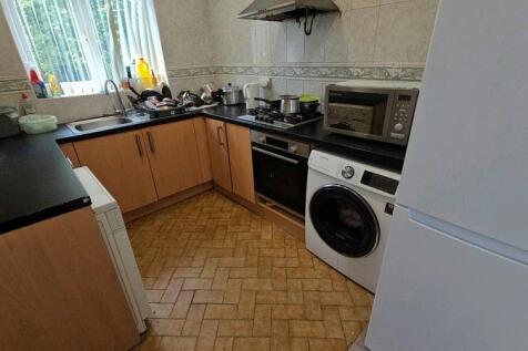 Bright galley-style kitchen with good counter s...