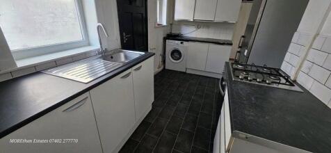 Bright and functional kitchen featuring modern ...