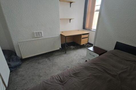 Well-presented bedroom with a comfortable bed, ...