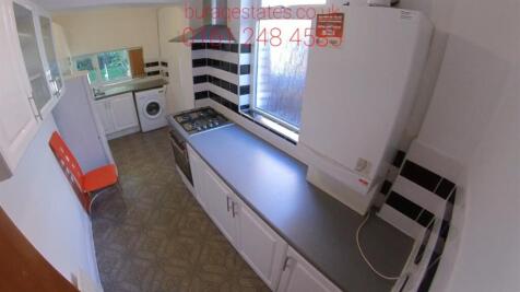 A well-organized kitchen area with ample counte...