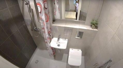 Modern, well-kept bathroom with a walk-in showe...