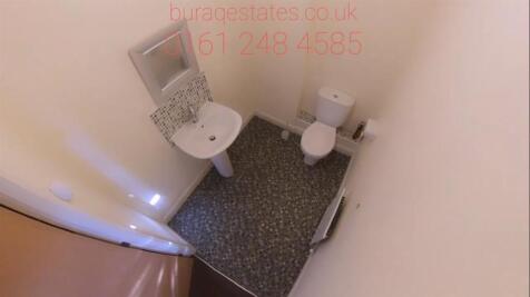Compact, well-kept WC with a pedestal sink, mod...