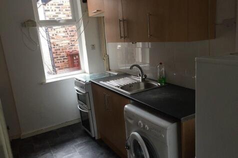 Compact, practical kitchen with fitted cabinets...