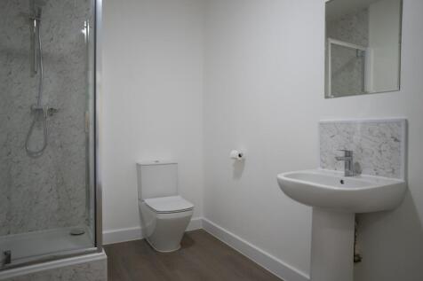 A modern and clean bathroom featuring a stylish...