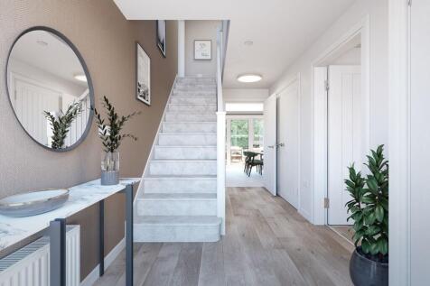 A welcoming hallway with under stairs storage