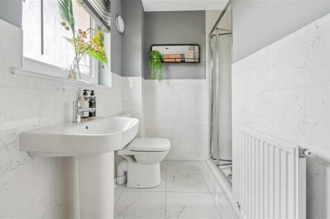 The main bedroom also benefits from a handy en suite