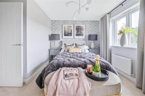 Bedroom two enjoys views of the rear garden