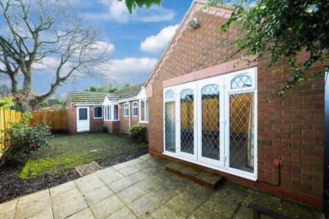 REAR VIEW OF PROPERTY AND GARDEN