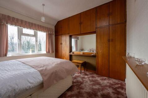 BEDROOM NO. 1 (FRONT) with wardrobes