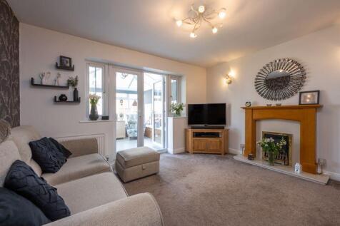 LOUNGE into CONSERVATORY