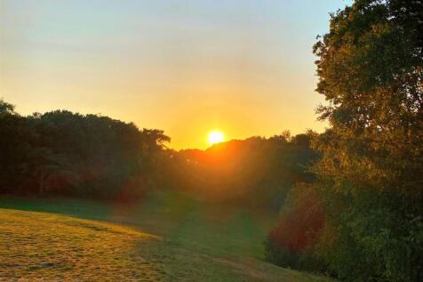 Queens Park sunset (across the road)