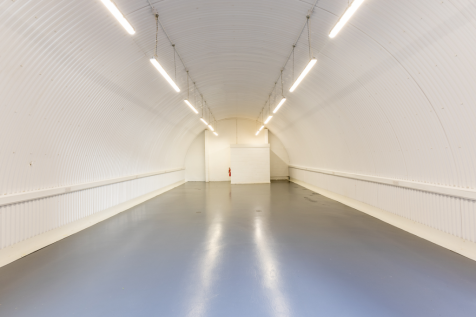 An empty arch with white lining