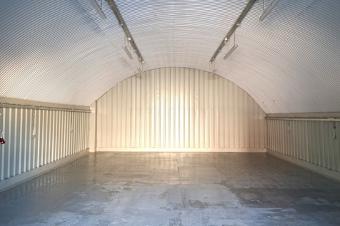 An empty arch with white lining