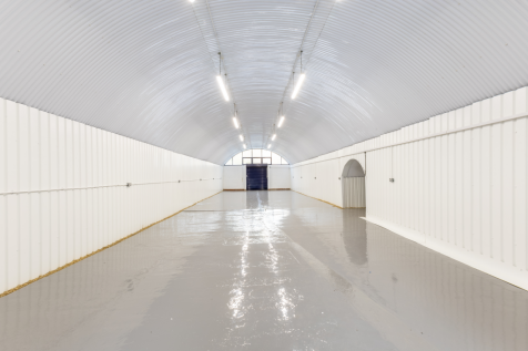 An empty arch with white lining