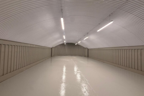 An empty arch with white lining