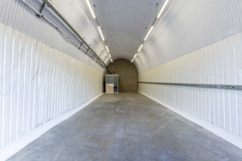 An empty arch with white lining