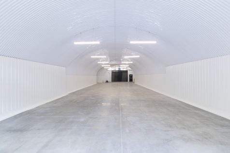 An empty arch with white lining