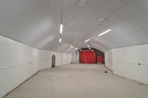 An empty arch with white lining