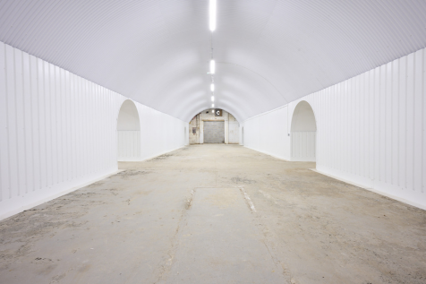 An empty arch with white lining