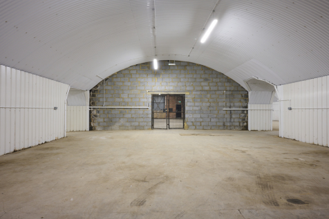 An empty arch with white lining