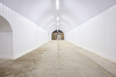 An empty arch with white lining