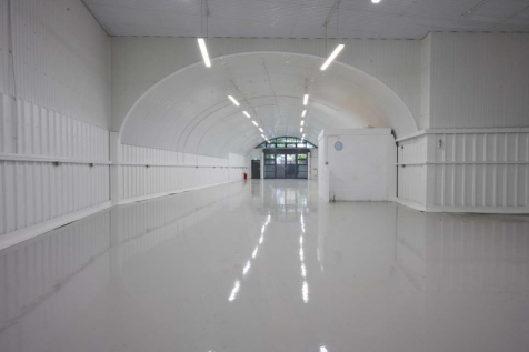 An empty arch with white lining