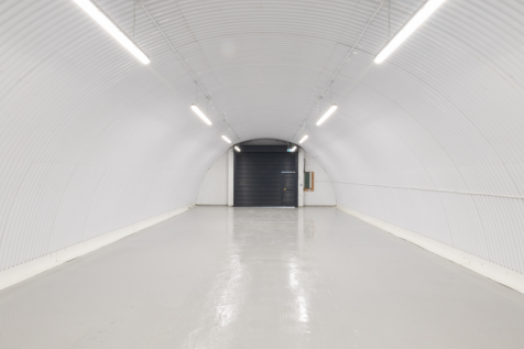 An empty arch with white lining