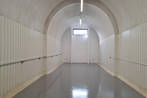 An empty arch with white lining