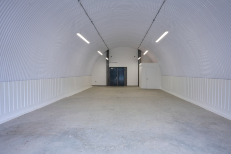 An empty arch with white lining