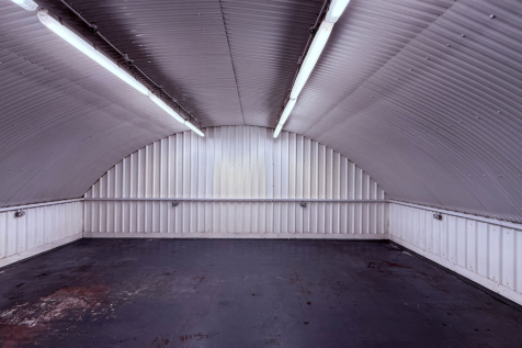 An empty arch with white lining