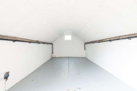 An empty arch with white lining