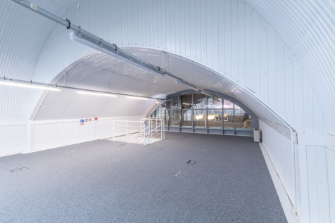 An empty arch with white lining