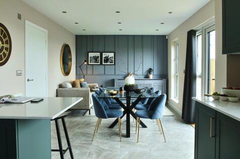 French doors open from the dining area to the rear garden
