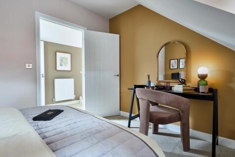 The fourth bedroom found on the top floor is perfect for guests