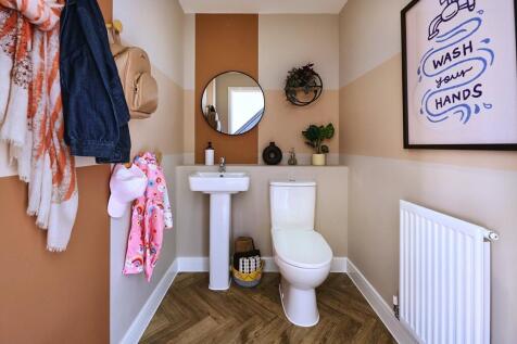 A handy cloakroom completes the ground floor