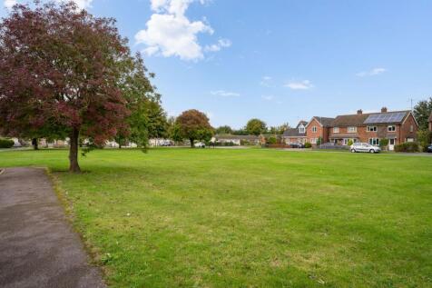 View from front overlooking a small green