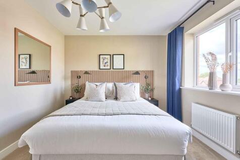 Main  bedroom with large windows allowing plenty of natural light