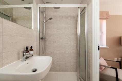 En-suite shower room away from the family
