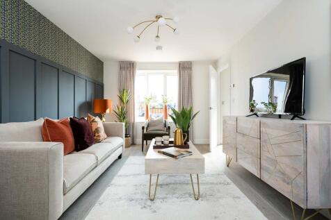 A cosy lounge sits to the front of the home