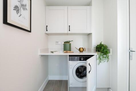 The utility room features an external door