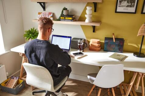 There&#39;s ample room in the bedroom to dedicate space for a home office