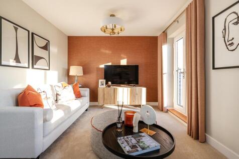 The living room is the full width of the first floor